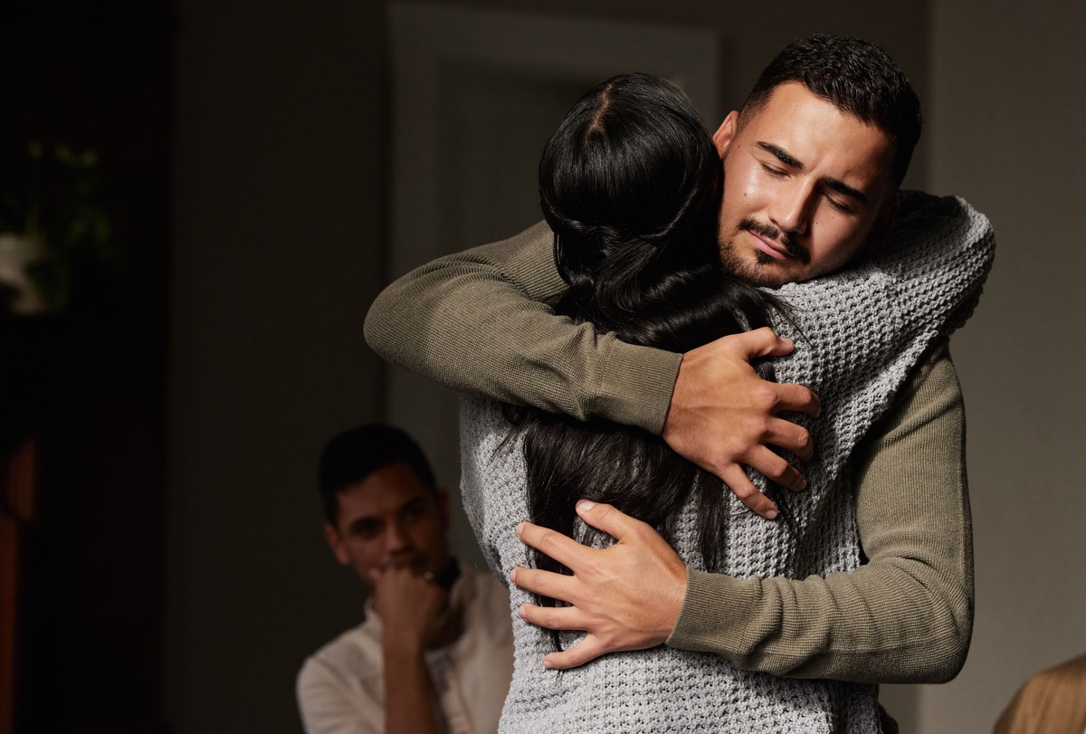hugging people