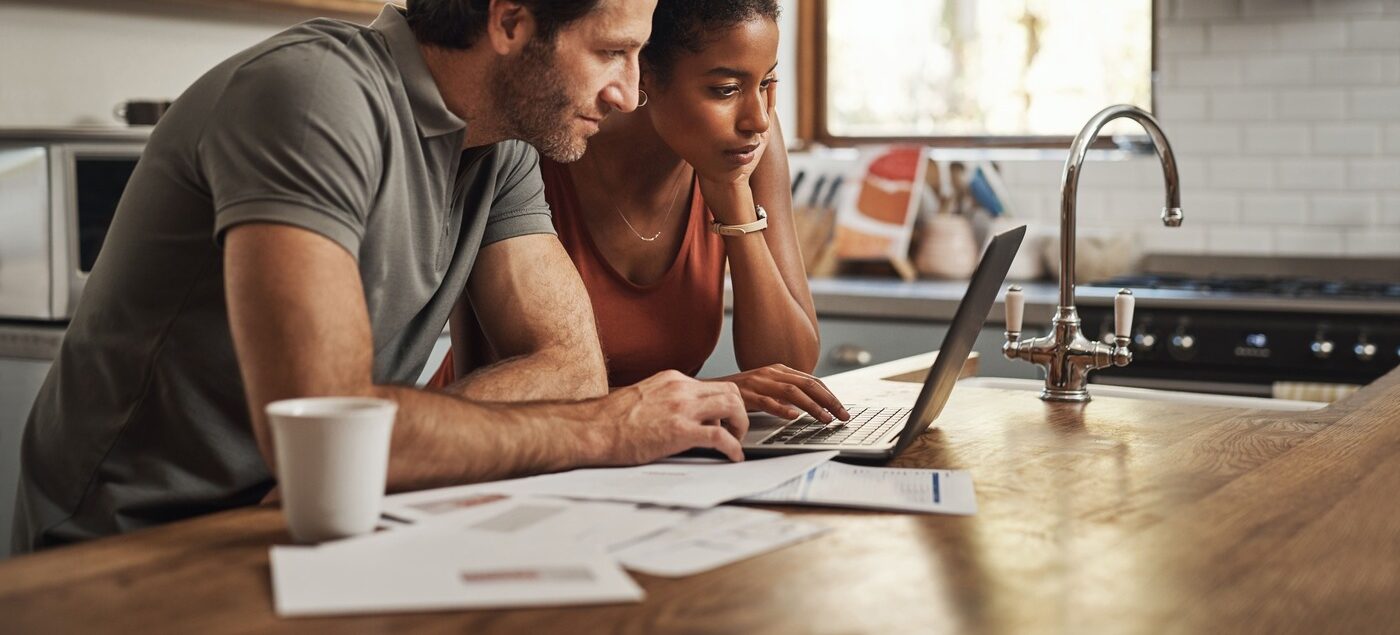 couple looking at a laptop